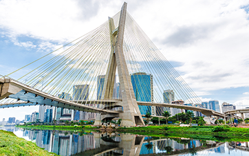 Brazil: View of the Ponte Octavio Frias de Oliveira bridge that crosses the Tiete River. In the background the skyline of Sao Paulo