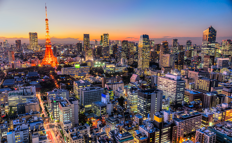 Japan: Aerial view of Tokyo at night with many brightly lit buildings