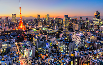 Japan: Aerial view of Tokyo at night with many brightly lit buildings